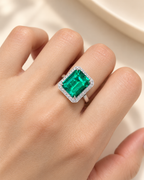 Emerald Cut Hydrothermal Lab-Grown Emerald Classic Halo Statement Ring with Natural-Style Jardin Inclusions