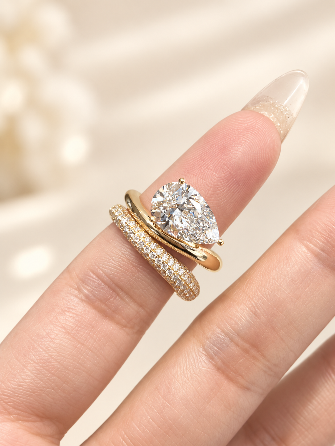 18K Floating East-West tilted Pear & Pavé Wave Stacking Ring Set