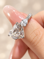 Heart-Shaped Lab-Grown Diamond Three-Stone Engagement Ring with Pear Accents & Pave Band