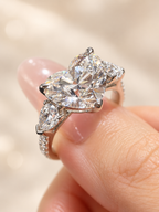 Heart-Shaped Lab-Grown Diamond Three-Stone Engagement Ring with Pear Accents & Pave Band