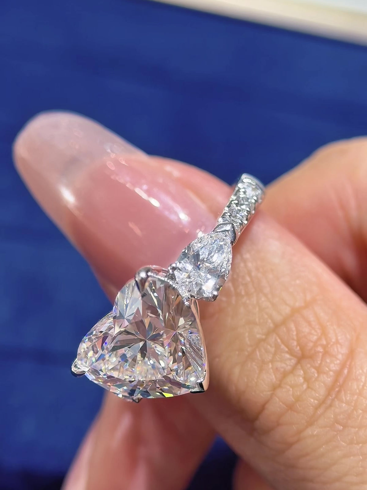 Heart-Shaped Lab-Grown Diamond Three-Stone Engagement Ring with Pear Accents & Pave Band